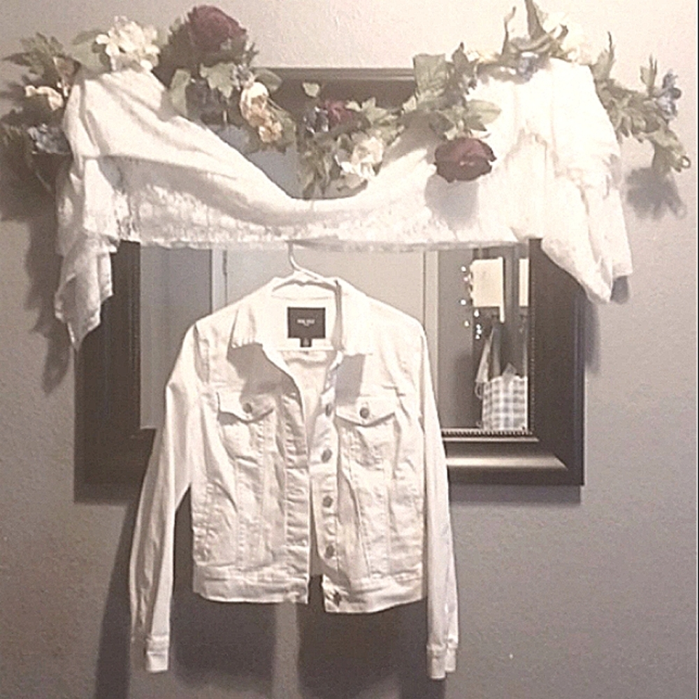 A jean jacket by Nine West